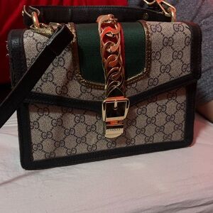 Gucci Beige and Black Crossbody Bag with Gold Accents